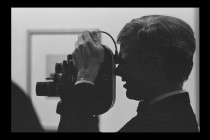 #43, Andy Warhol (with camera at Ferus Gallery), 1962